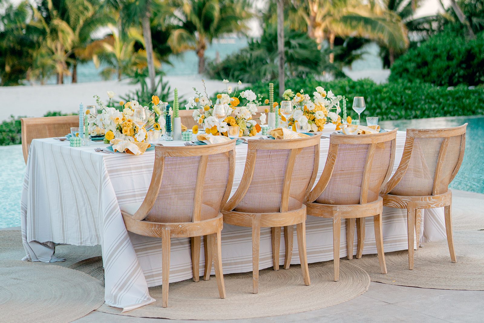 Evening wedding reception under the palms in the Riviera Maya