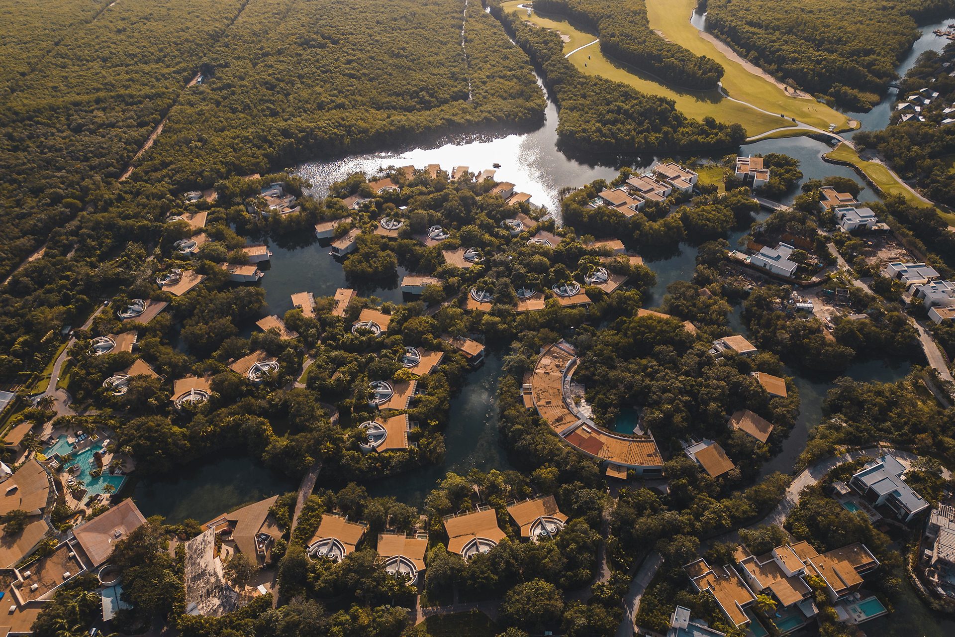 Mayakoba lagoon and boardwalks at golden hour, Riviera Maya